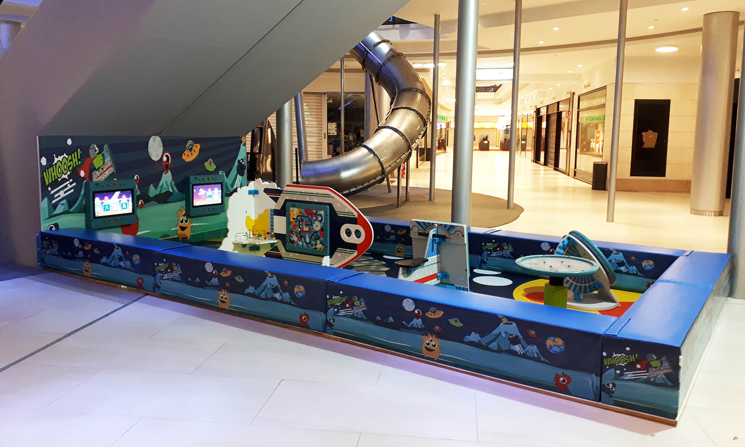 This image shows a custom kids corner within a shopping center in Spain